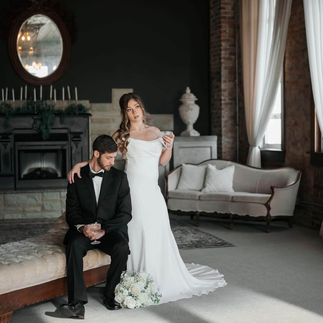 Reception layout with round tables and tall floral centerpieces